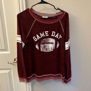 Oddy L maroon/burgundy long sleeve sweater with words “game day y’all”